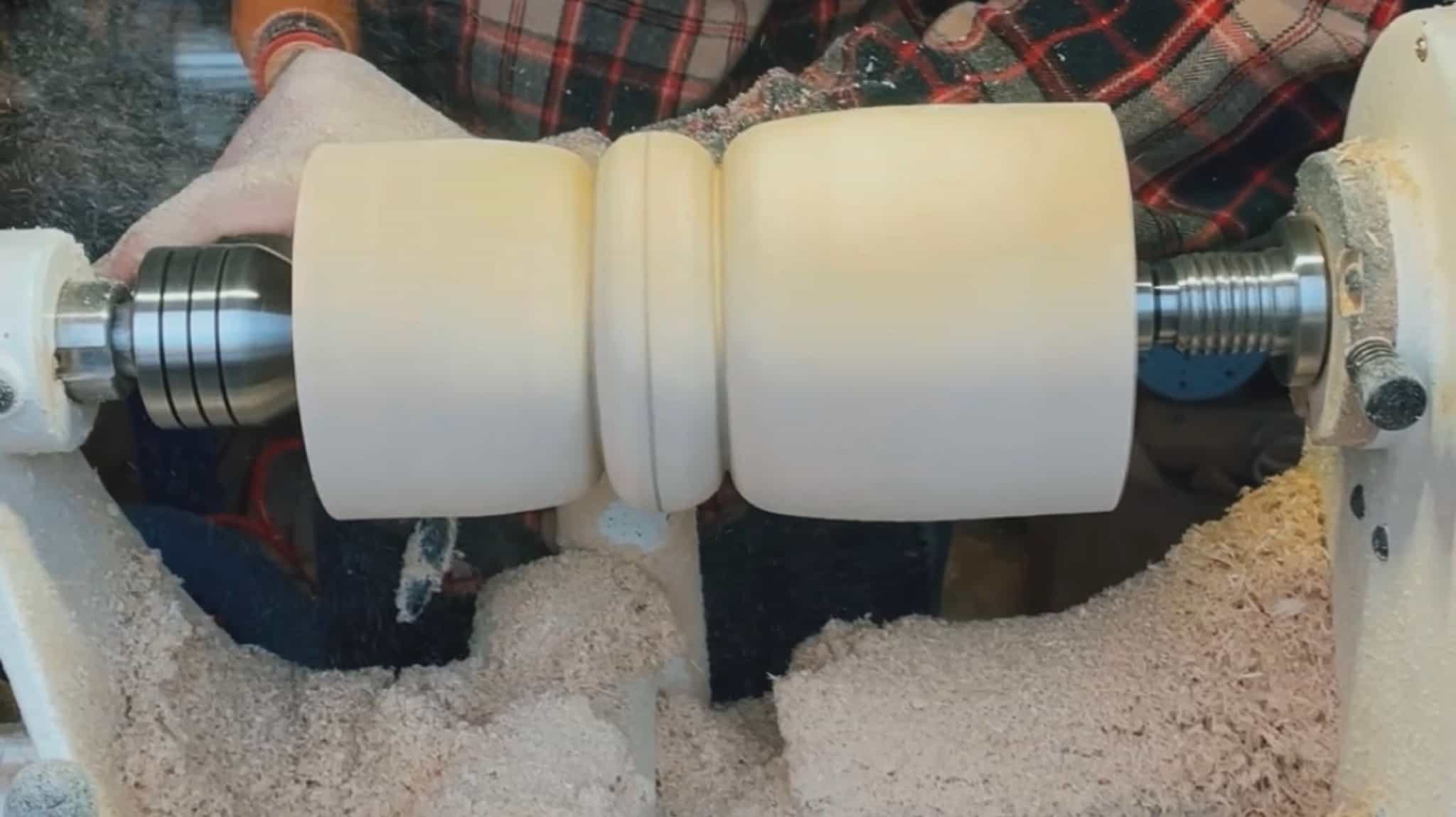 Load video: Join us in the workshop as our skilled woodturner brings a wooden candle stand to life on the lathe. Watch as they turn, sand and finish this beautiful piece.
